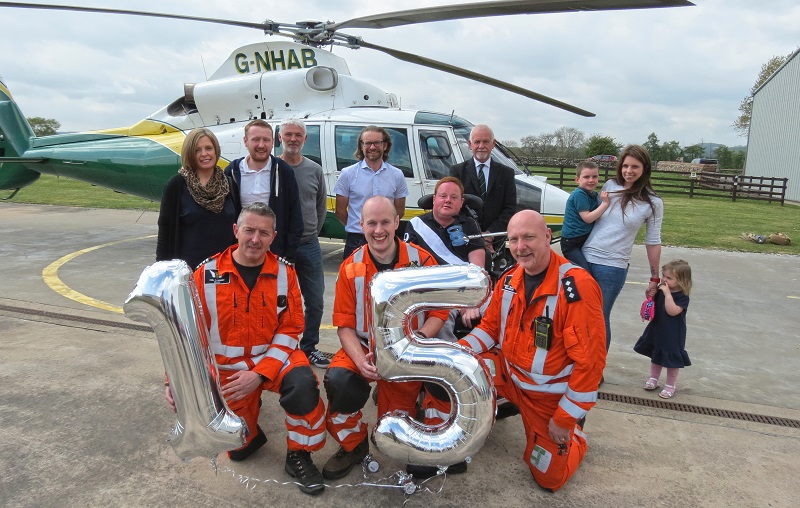 Back row – Alison, Marc and Andrew Reed, Neil Wilson, Will Clark, GNAAS chief executive Grahame Pickering MBE, Aiden, Rachel and Scarlett Hall. Front row – GNAAS pilot Phil Lambert, doctor Chris Johnson and paramedic Terry Sharpe.