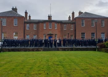 Police recruits celebrate a year in the role