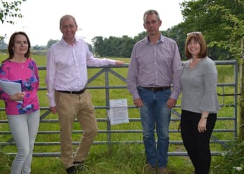MP visits proposed power plant site with local campaigners