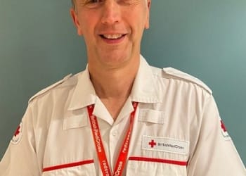 Coin gift for Cumbria volunteer on British Red Cross’s 150th birthday