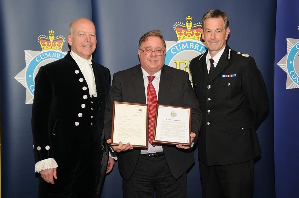 Crime Investigator Don McCutcheon flanked by High Sheriff Alistair Wannop (left) and Chief Constable Jerry Graham (right).