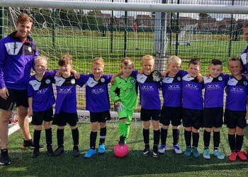 Football team walk more than 900 miles for local hospice