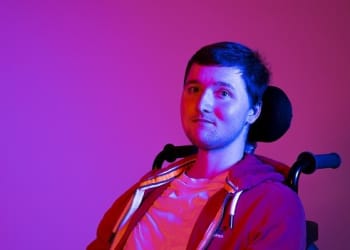 Young photographer gains degree with his autobiographical picture portrayal of life with a disability