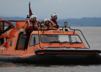 Search for missing swimmer scaled down