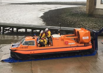 Hovercraft crew rescue woman trapped in mud