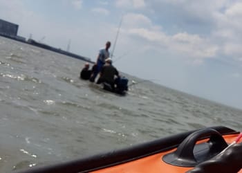 RNLI lifeboat crew rescue three stranded fishermen near Heysham