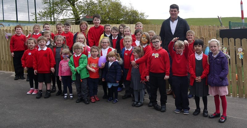 Carl Clark, one of the parents who helped with the construction and the school and nursery children