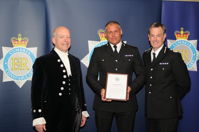 PC Spriggs pictured with High Sheriff Alistair Wannop (left) and Chief Constable Jerry Graham (right).