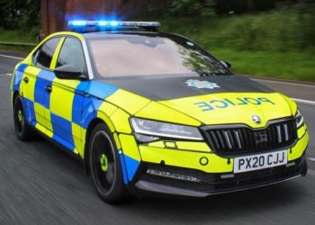 A Cumbria police Skoda vehicle responds to an incident with blue flashing lights