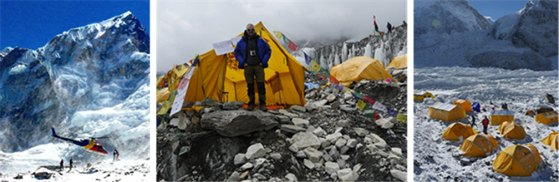 A helicopter lands at base camp, multi-media artist Derek Eland by the Diary Room, Everest basecamp.