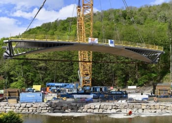 Massive crane lifts new Pooley Bridge into place
