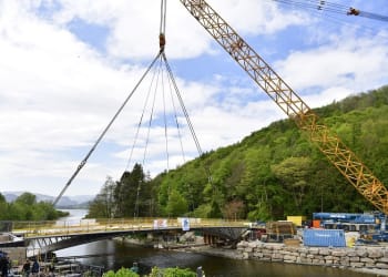Massive crane lifts new Pooley Bridge into place