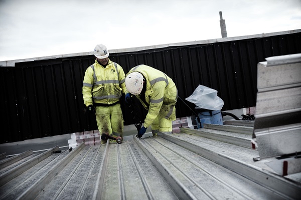 Amec Foster Wheeler staff at work on replacing the roof of the Vitrification Plant Store at Sellafield
