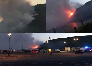 Firefighters tackling large grass fire at St Bees Head