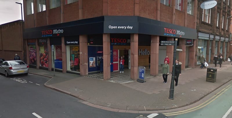 A Google Maps image of Tesco on Victoria Viaduct in Carlisle. People walk past the store