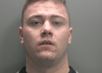 Banned driver rammed patrol car during high speed pursuit and left officers injured
