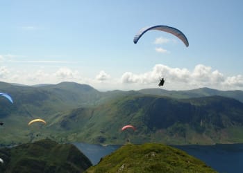 Paragliders donate to support local community groups
