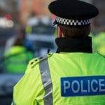 Police officer facing away from camera