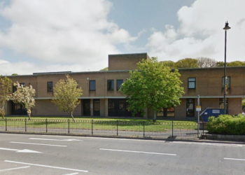 Man kicked out at police and urinated and spat in his cell