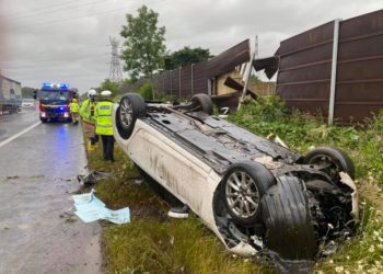 Firefighters in Carlisle have issued a warning to drivers after a car crashed into a fence and flipped onto its roof on the M6 between Carlisle and Gretna.