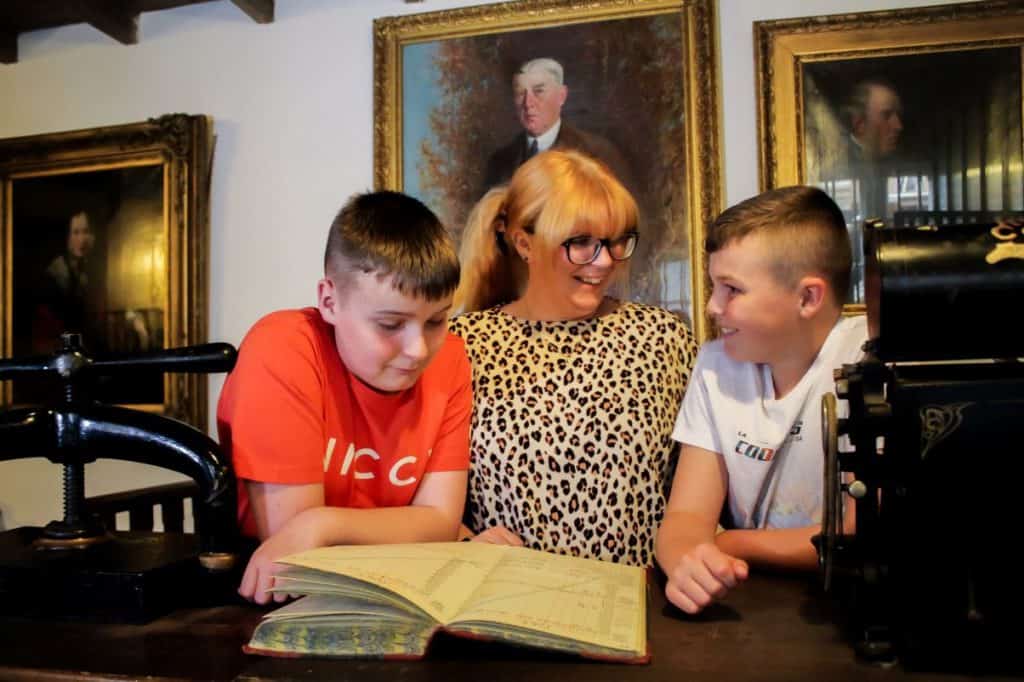Louise McKenna and her children at the Rum Story