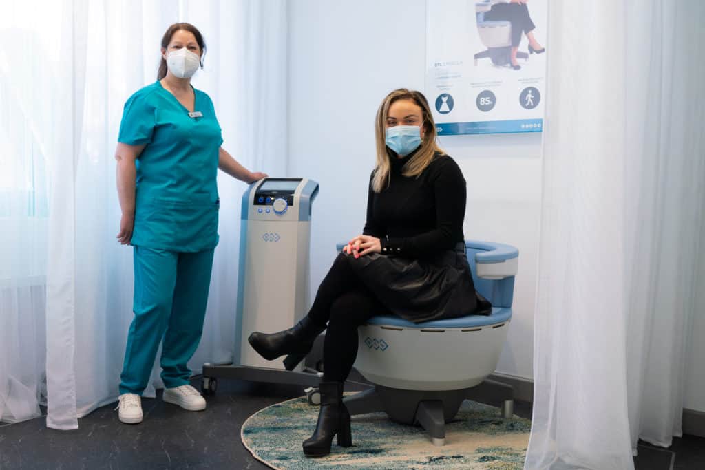 Susan Richardson, Nurse, and Vanessa Brown, Director at VL Aesthetics with the region's first revolutionary Emsella chair.