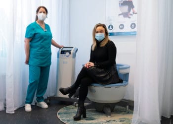 Susan Richardson, Nurse, and Vanessa Brown, Director at VL Aesthetics with the region's first revolutionary Emsella chair.
