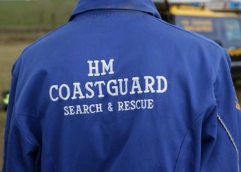 A HM Coastguard Search and Rescue blue jacket