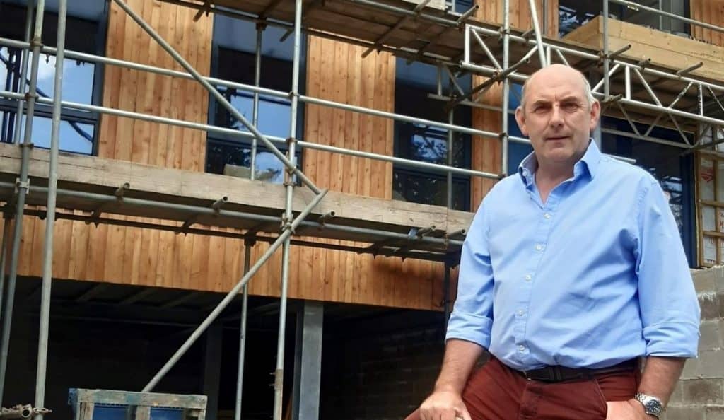Henry Wild at Skelwith Fold. Larches now clad the exterior of the park's new eco-friendly offices