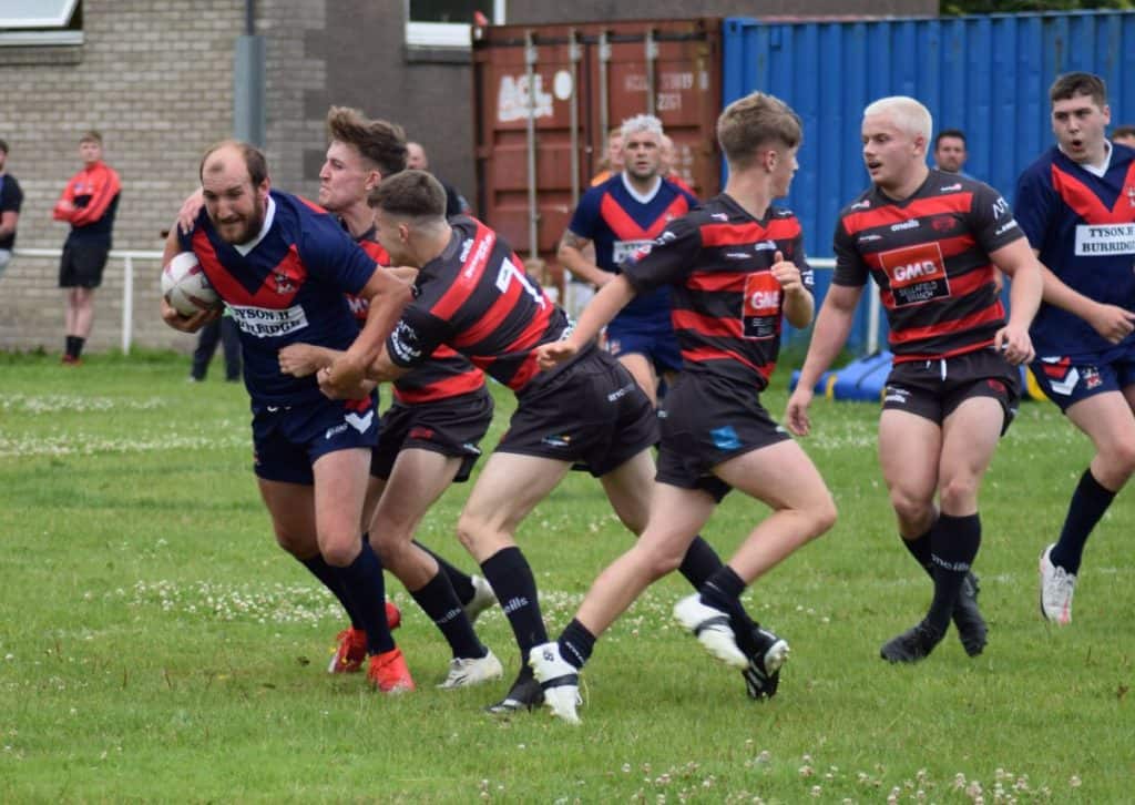 Scott George on his way for his try