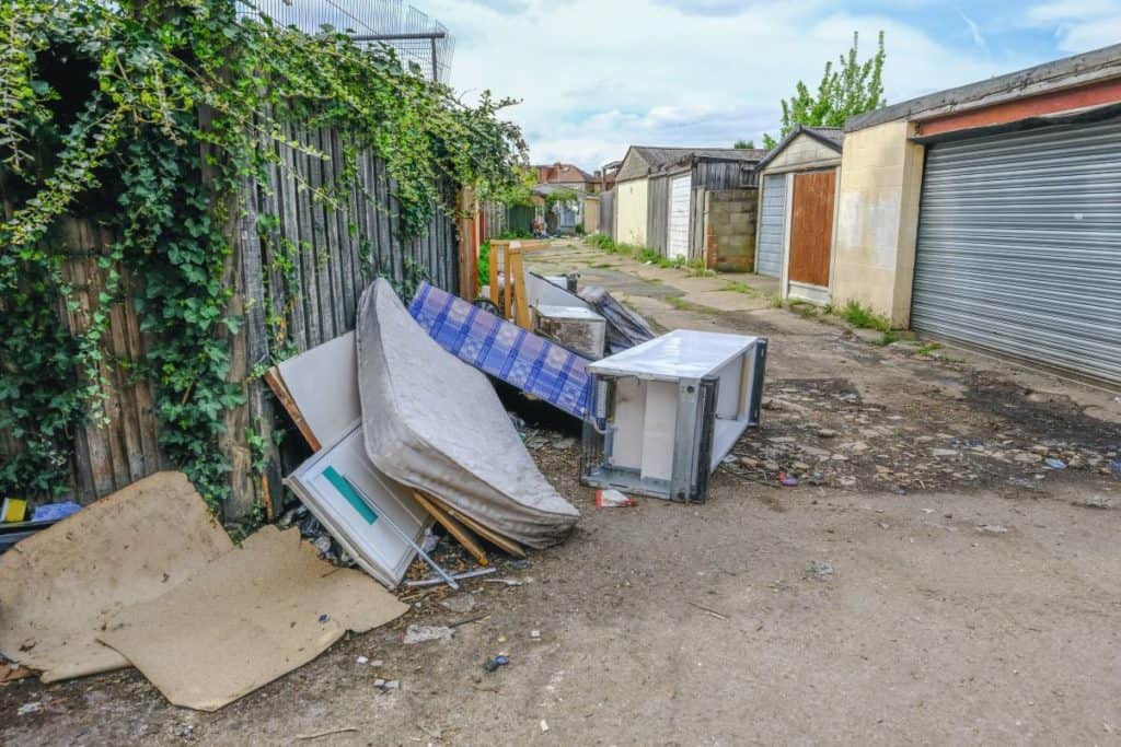 Fly-tipped items in back lane