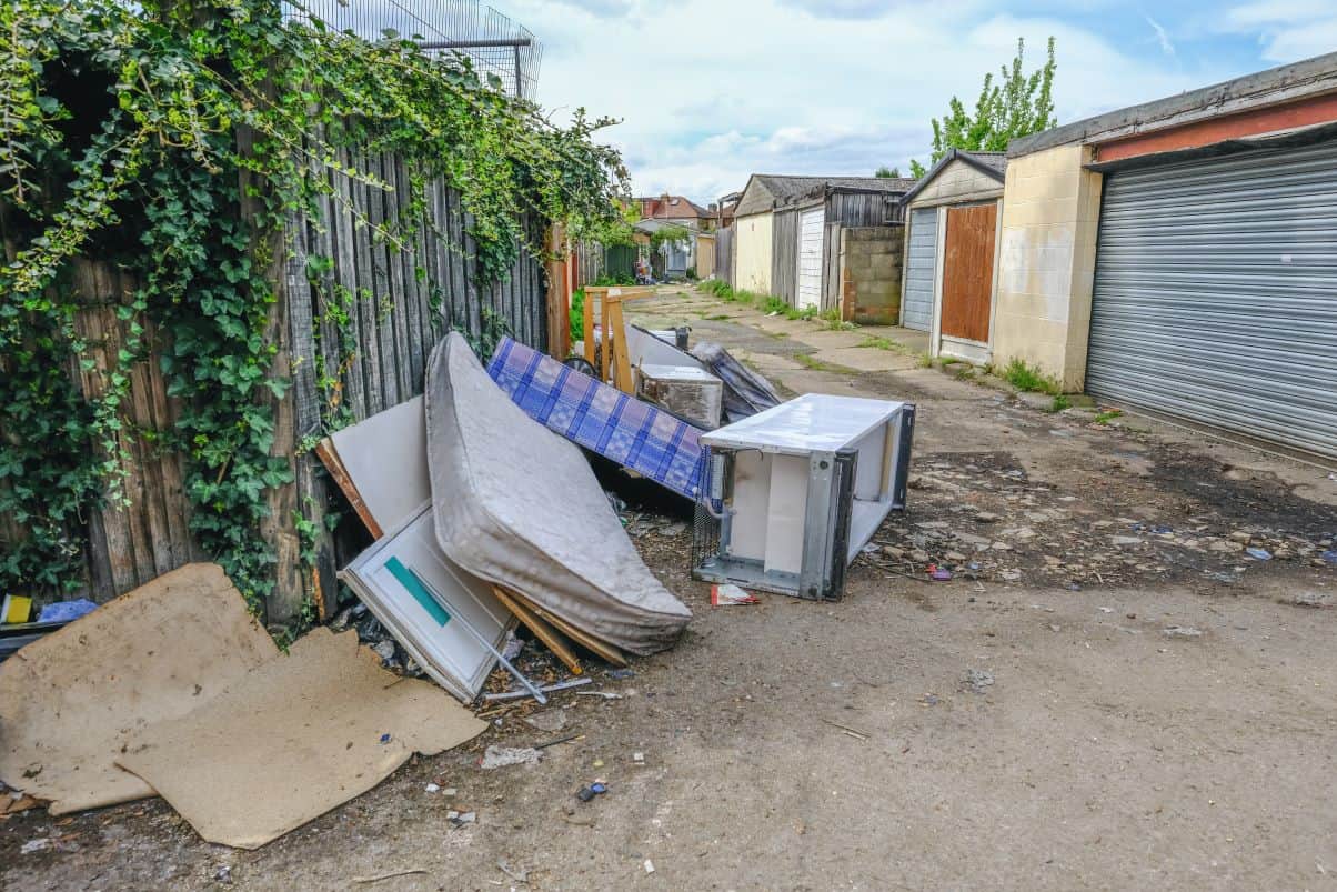 Fly-tipped items in back lane