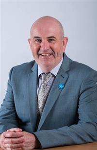 Cumbria County Councillor Mike Hawkins has been blamed Conservative austerity for a raft of redundancies at Cumbria County Council