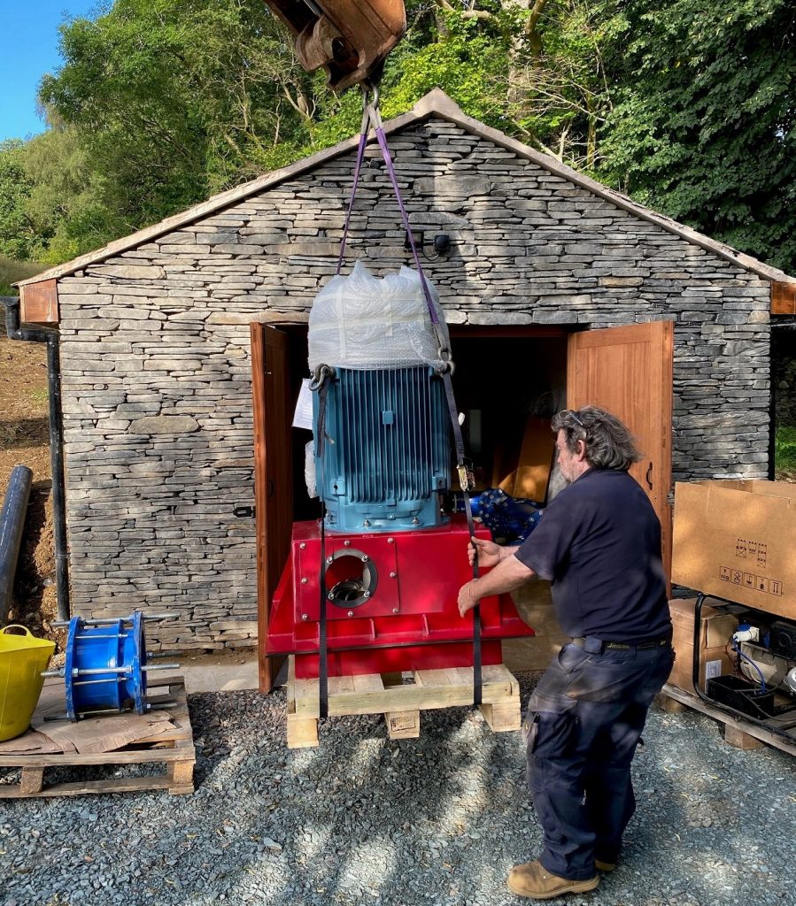 Low Wood Bay hydro electric turbine being installed in Lakeland style barn 