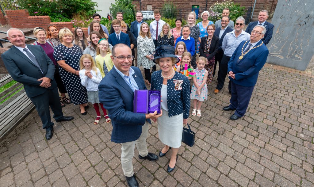 The REACT Foundation charity has been presented with The Queen's Award for Voluntary Service, by the Claire Hensman
