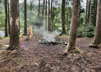 Youths throw gas canisters onto fire on Thirlmere island. Picture: Keswick Fire Station