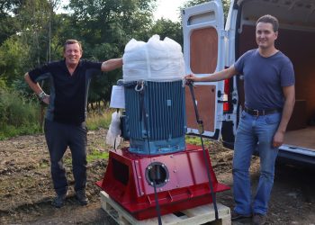 Tim Berry (left) from English Lakes Hotels and Roberto Sotgiu from Hydrolite with the turbine