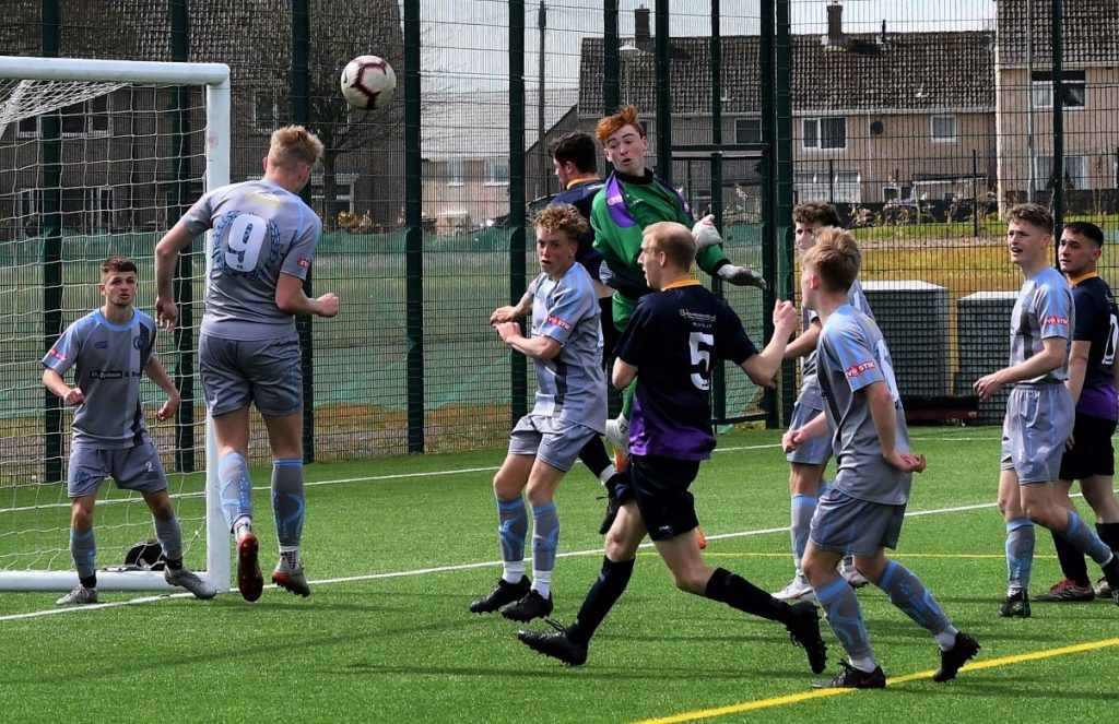 Workington defend against a Maryport corner. Picture: Ben Challis