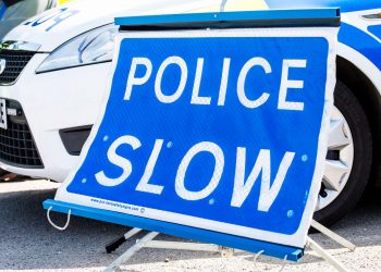 police slow sign