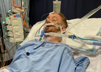 Parents’ desperate plea for help to get them to bedside of critically ill son in Australia