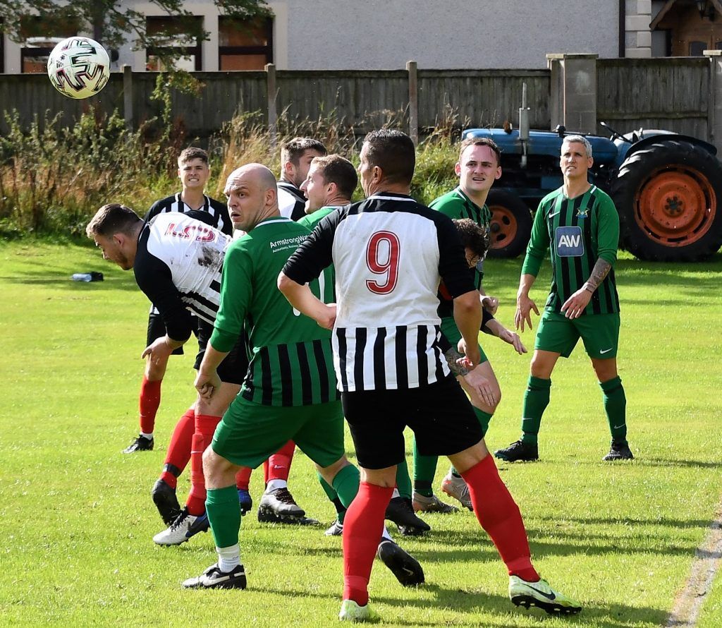 Deer Orchard and Dearham battle for the ball