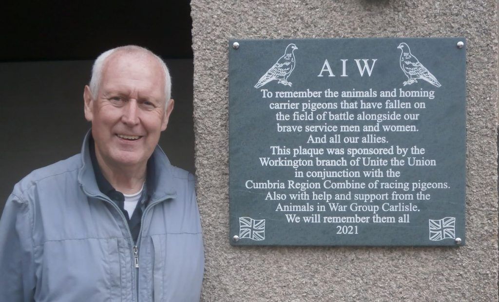 Les Blacklock and plaque commemorating pigeons in wartime
