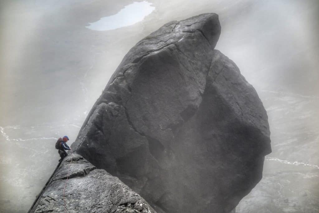 Anna Taylor tackles the final section of Cioch Nose on Skye as the rain falls - photo credit Neil Gresham