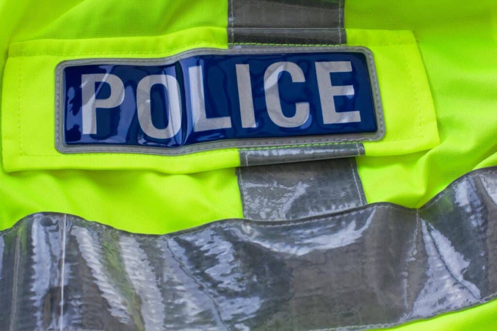 Police are hunting a grey tracksuit-wearing man after a car was "deliberately" set alight in Workington. 