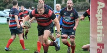 Matthew Atkinson's bullocking run earns him a try for Aspatria. Picture Barney Clegg.