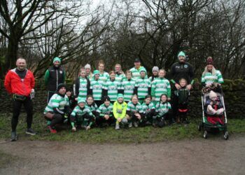 Young footballers join marathon man Gary McKee