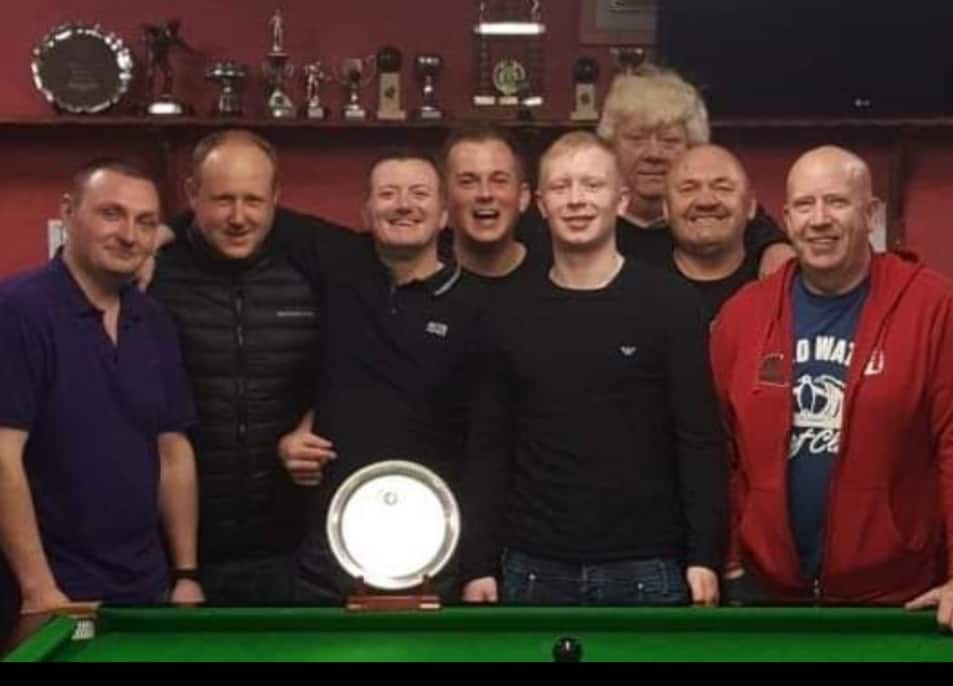 Ian Johnston, pictured right at the back with the last team he played for, Station Road D