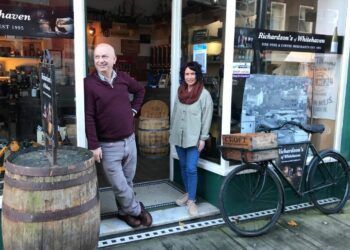 How many times a day do Cumbrian businesses post on social media?