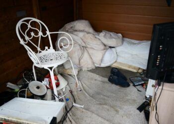 Shed with chair and bedding