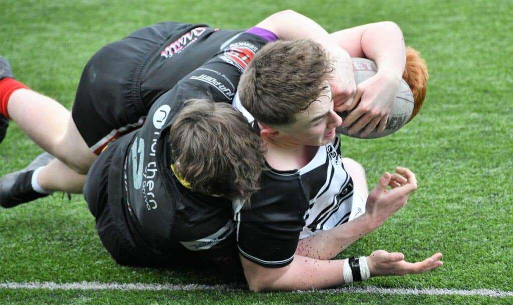 Tom Chambers twists in to score his first try. Picture: Ben Challis